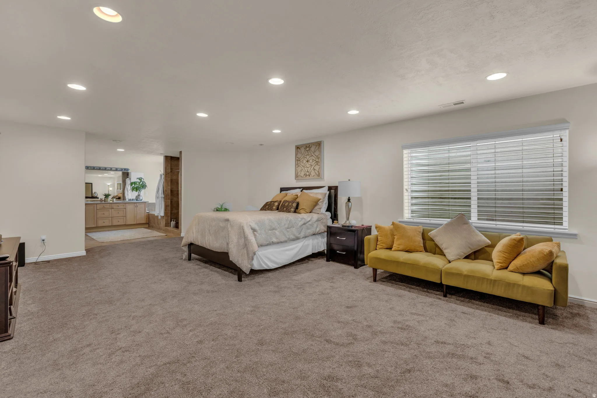 Bedroom featuring recessed lighting and light colored carpet
