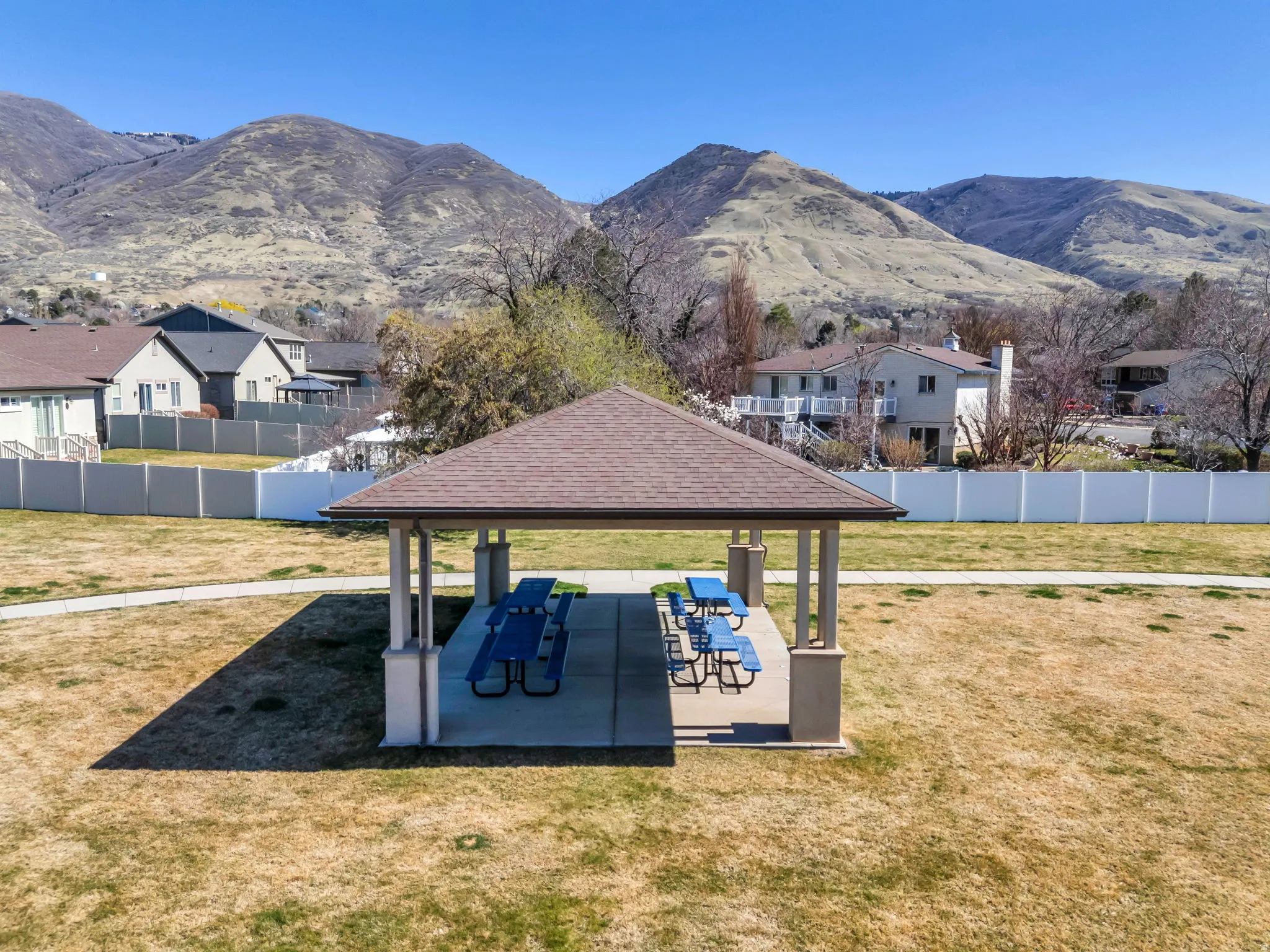 View of yard featuring a patio area, a mountain view, and a residential view