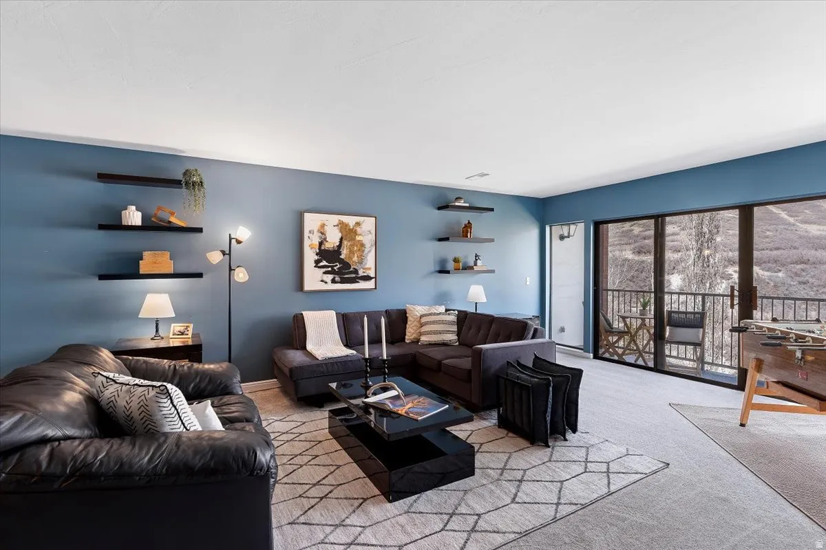 Living area featuring carpet