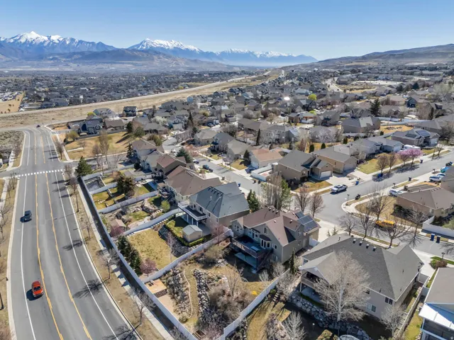 View of property location featuring a mountainous background and nearby suburban area