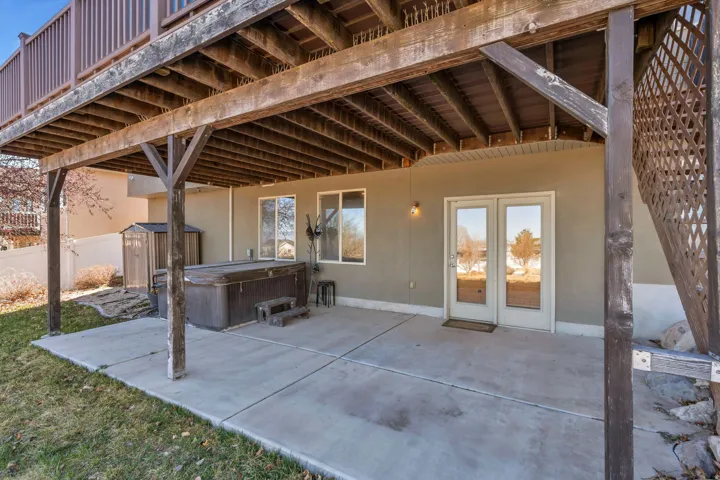 Walk out basement entrance with hot tub