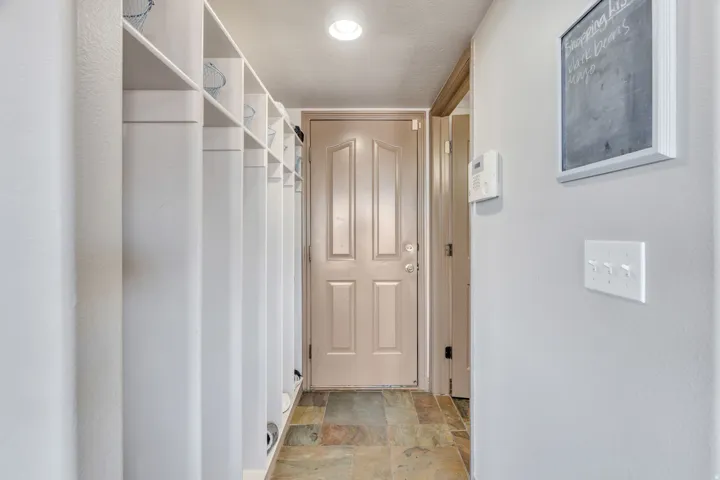 Entry from garage with built in cubbies