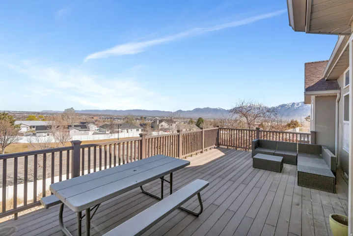 Deck with a residential view, a mountain view, and outdoor lounge area