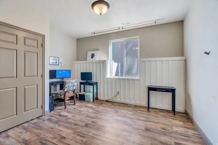Office space with wood finished floors