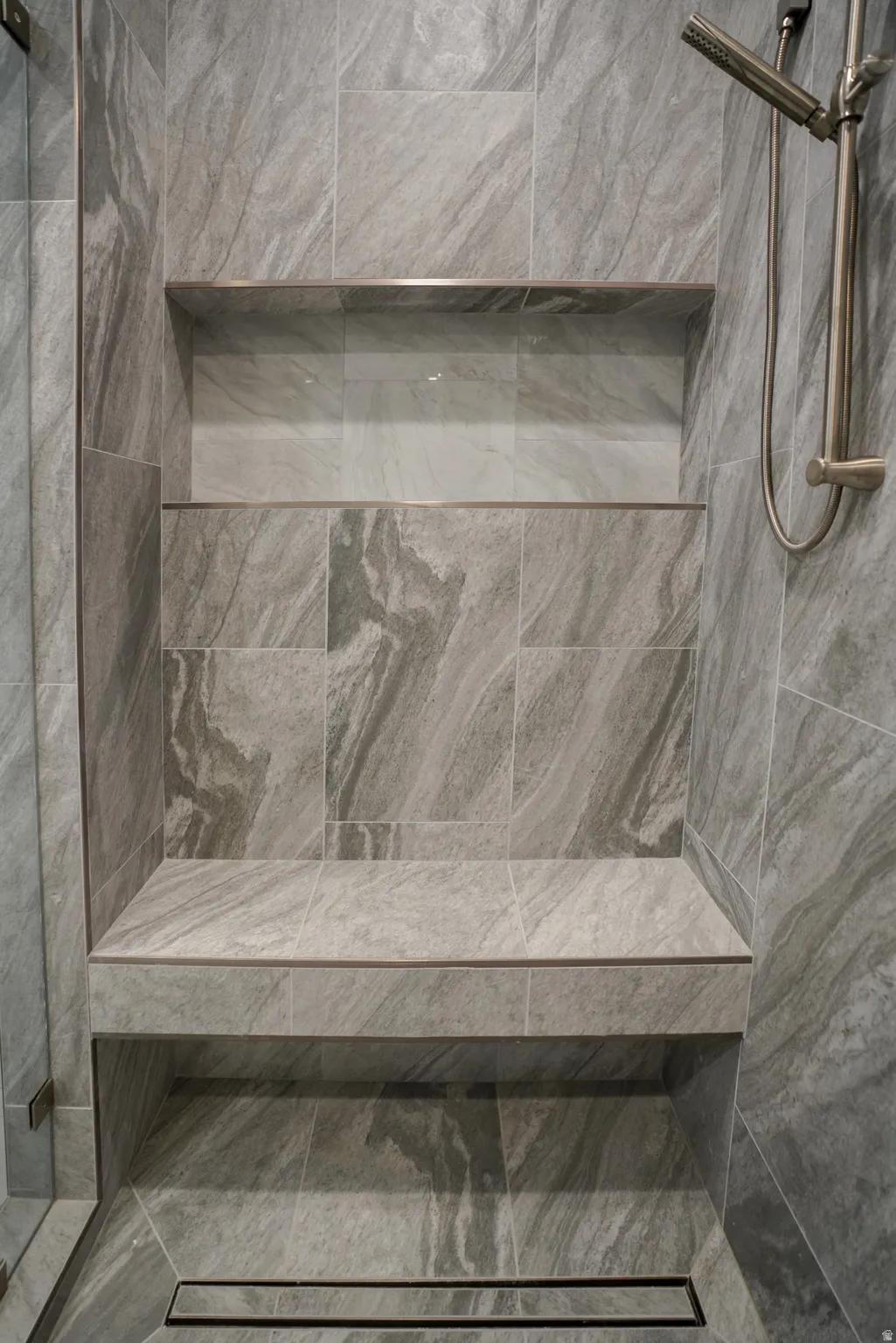 Bathroom view of tiled shower