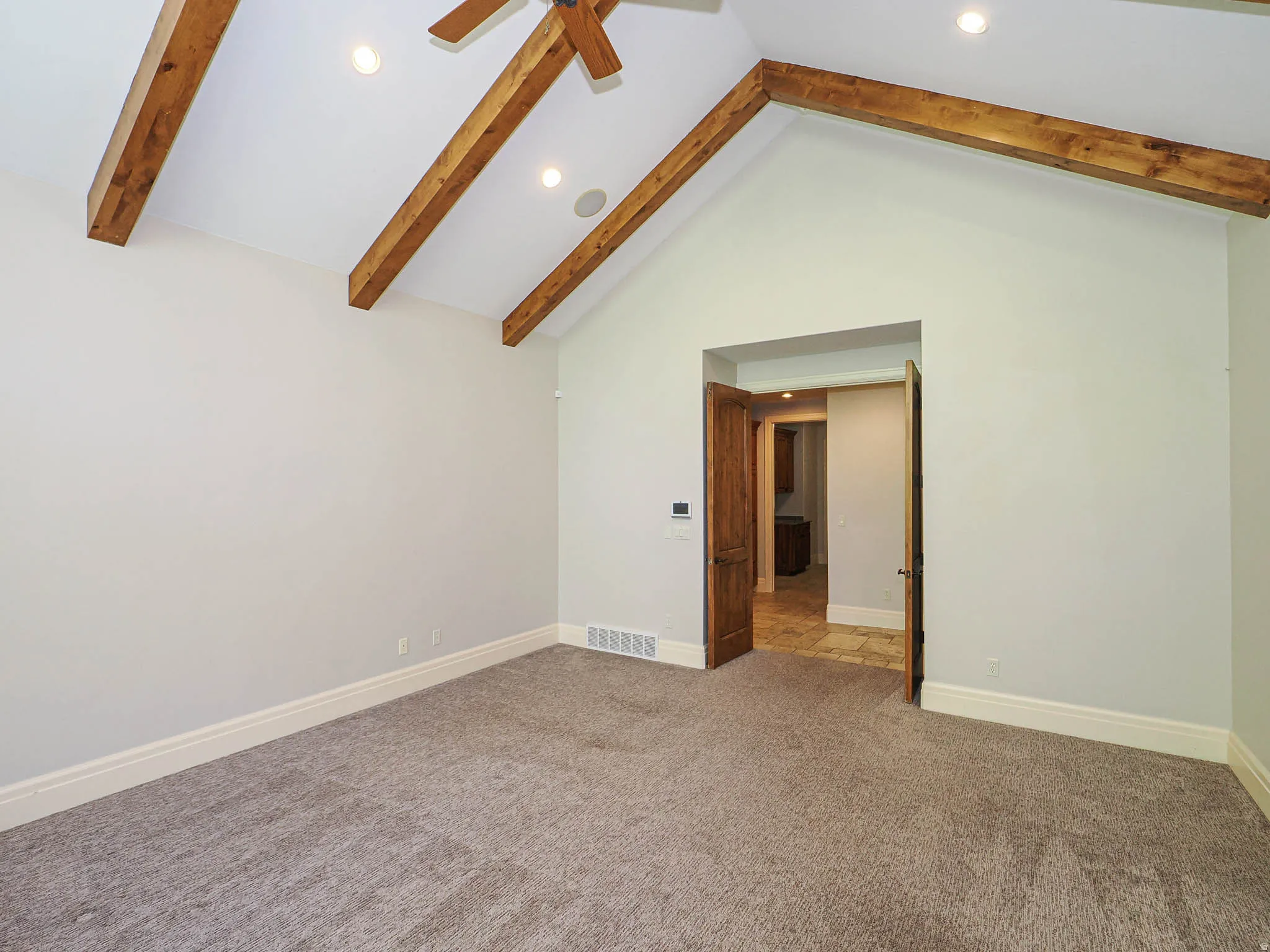 Unfurnished room with recessed lighting, carpet floors, and a ceiling fan