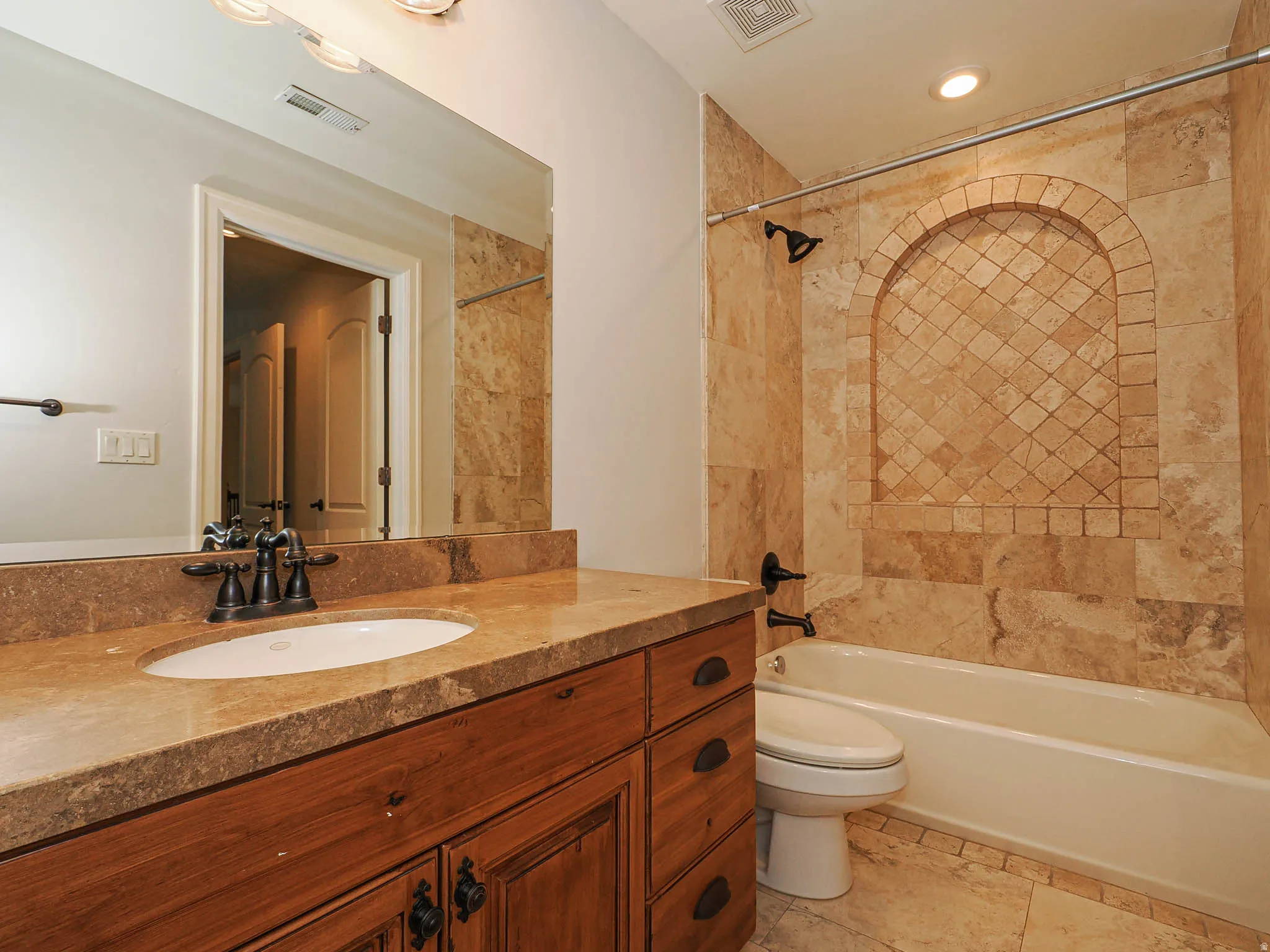 Full bathroom with vanity and shower / bathtub combination