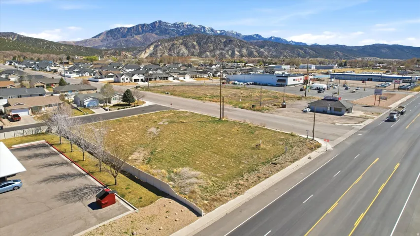 View of mountain background featuring nearby suburban area