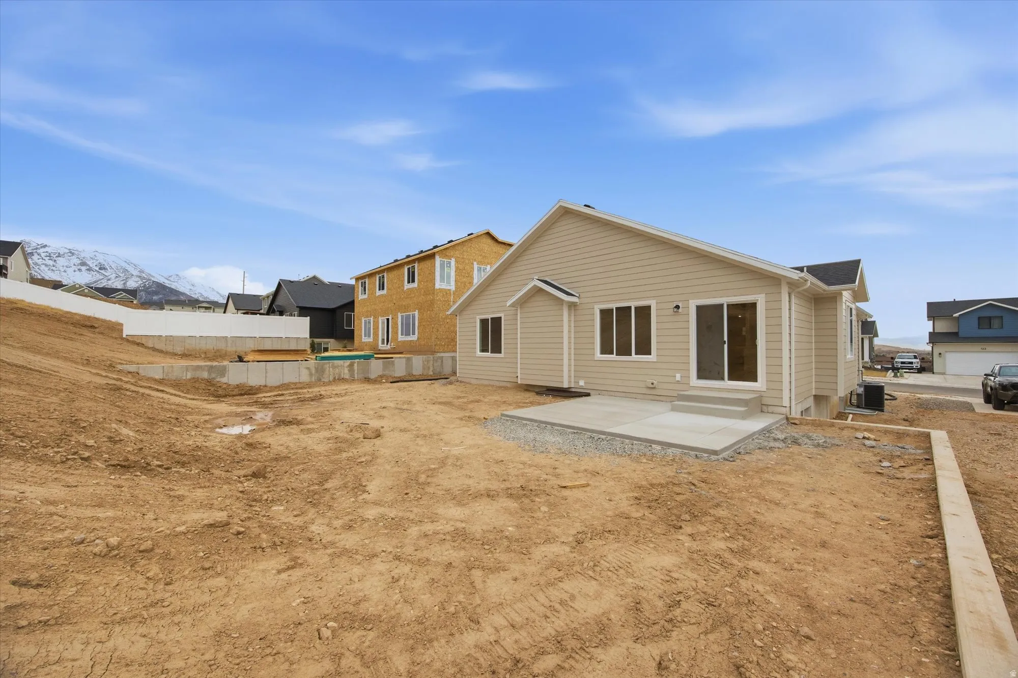 Rear view of property featuring a patio area