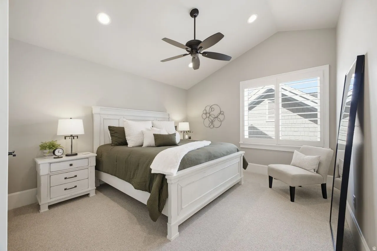 Upper Level Bedroom with lofted ceiling, recessed lighting,, and ceiling fan