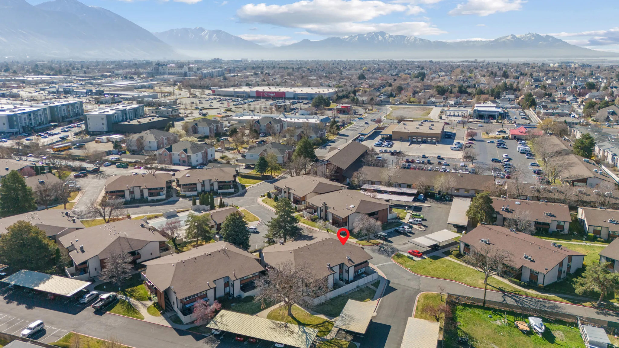 Aerial overview of property's location with a mountain backdrop