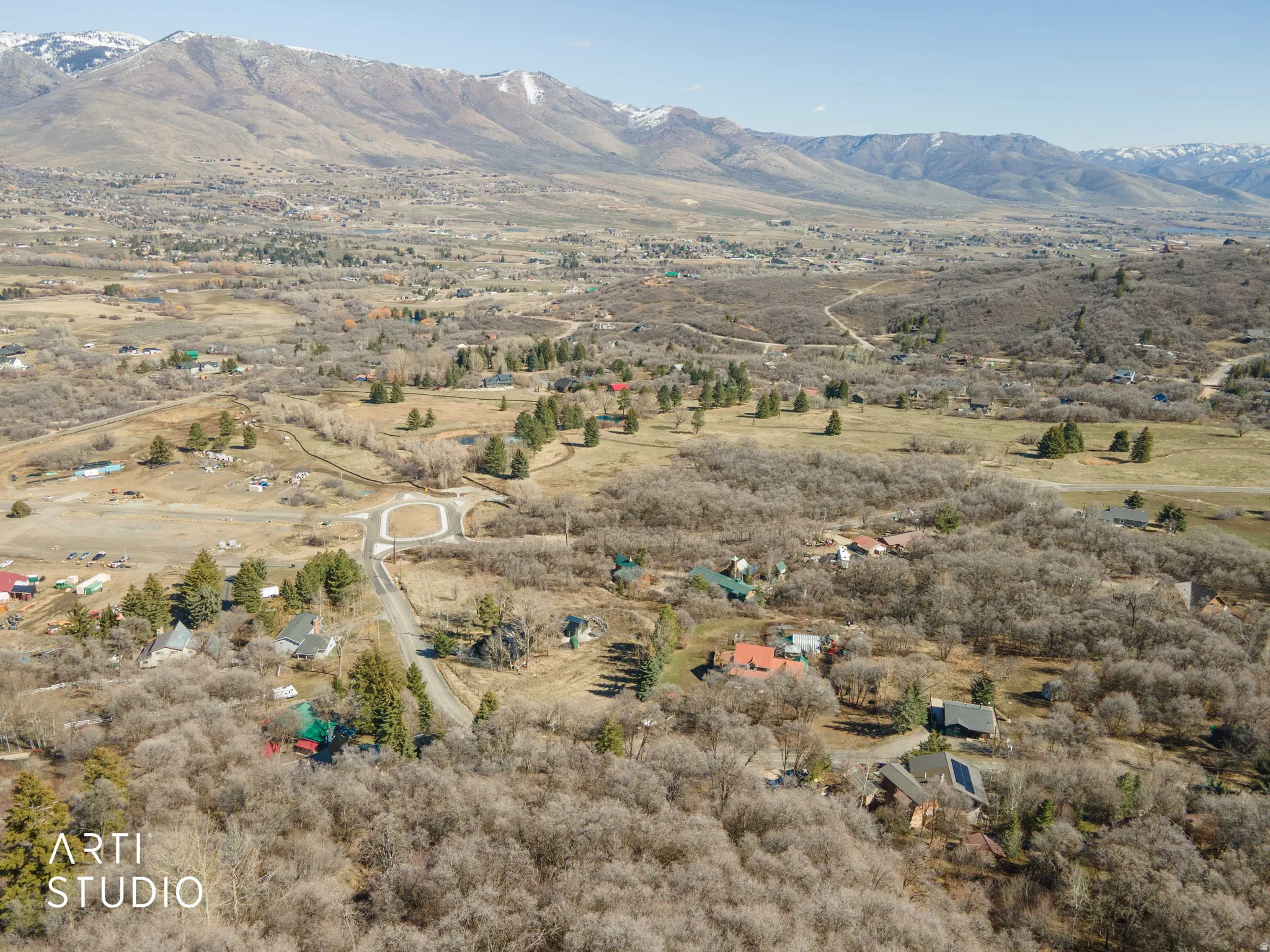 View of mountain background featuring rural landscape