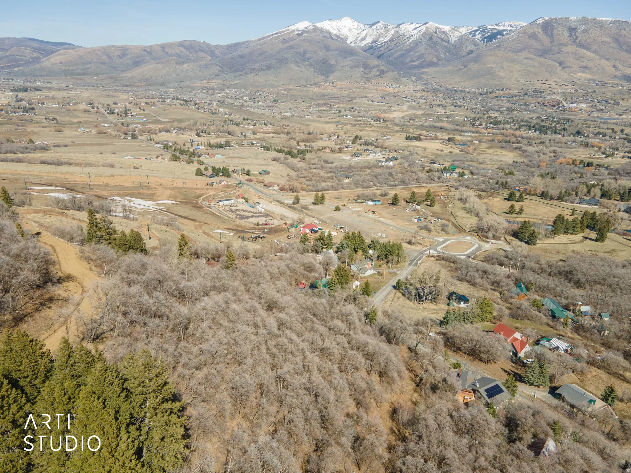 View of mountain backdrop featuring rural landscape