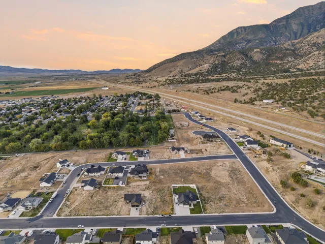 Developing residential area with paved streets and new construction homes