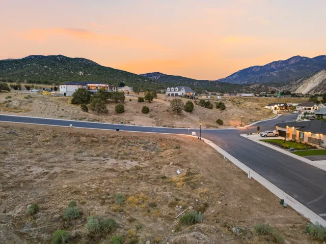 Mountainous landscape with developed road infrastructure and residential properties