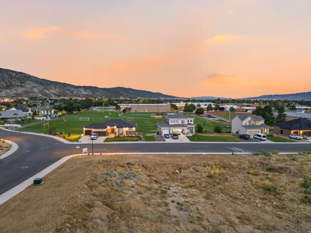 New construction homes featuring modern exteriors and attached garages