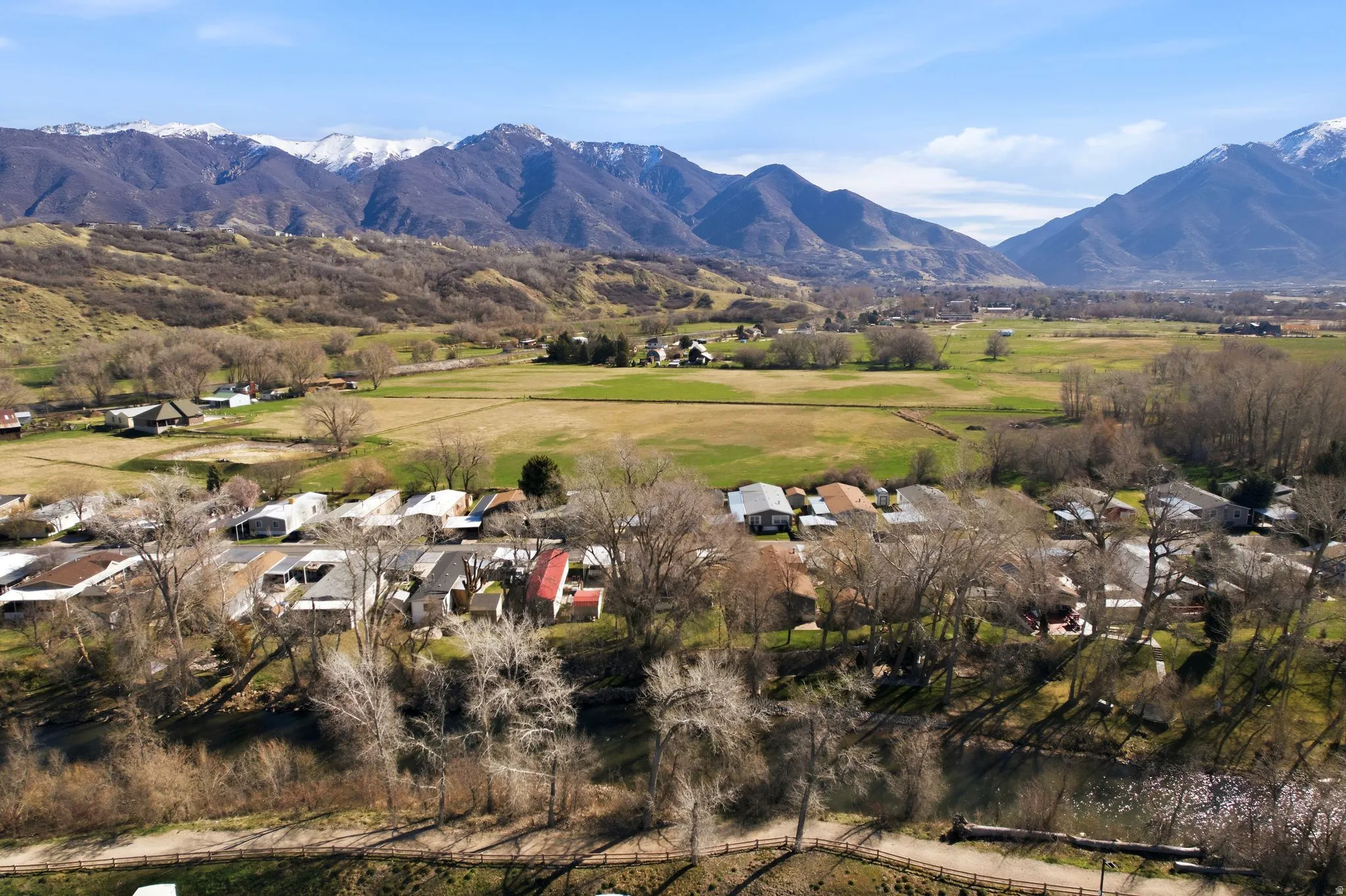 View of mountain background featuring nearby suburban area