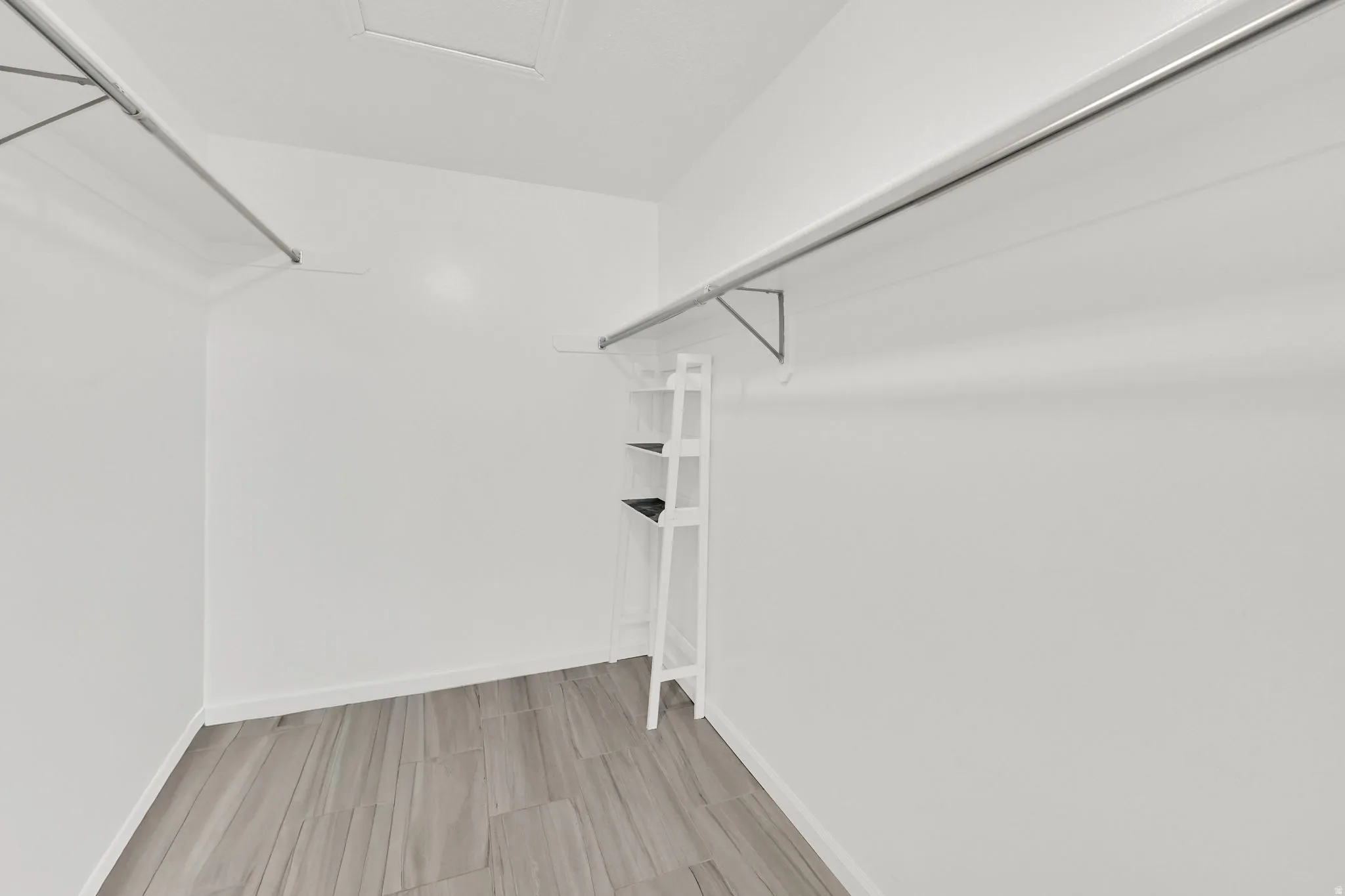 Walk in closet with attic access