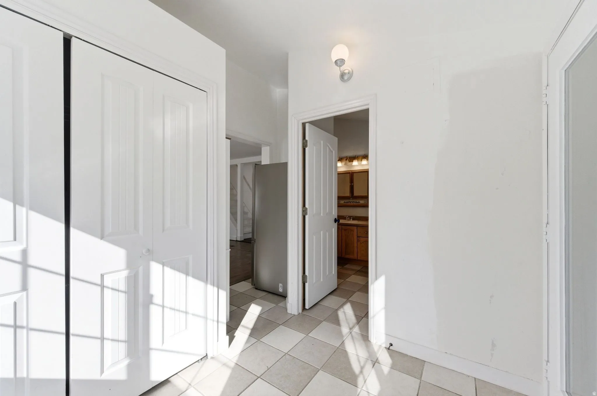 Bathroom featuring light tile patterned floors