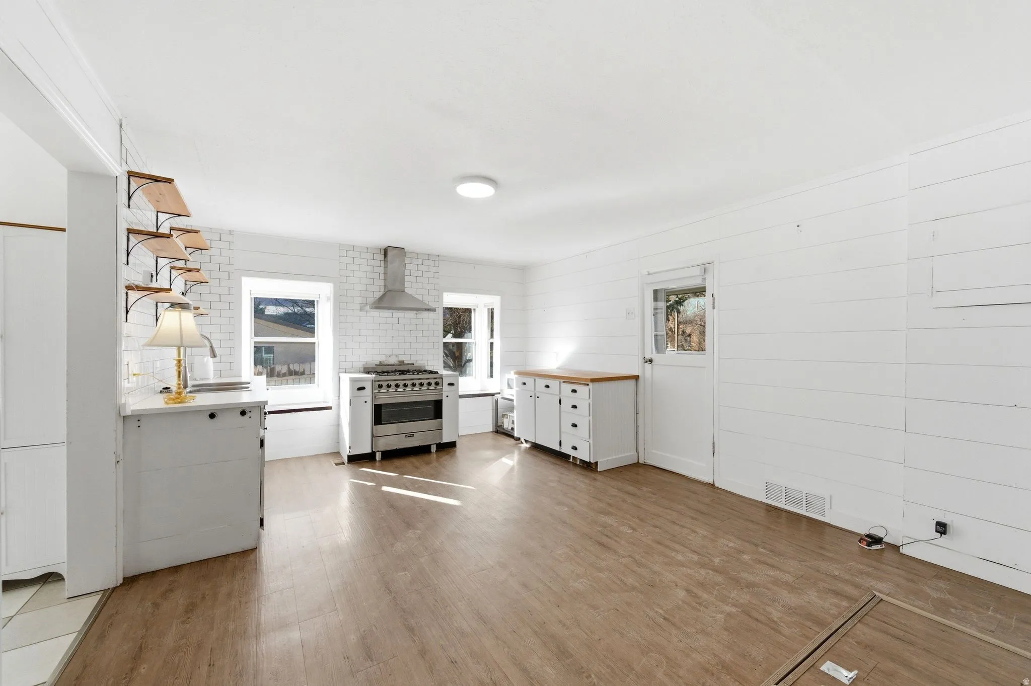 Unfurnished living room with light wood-style floors