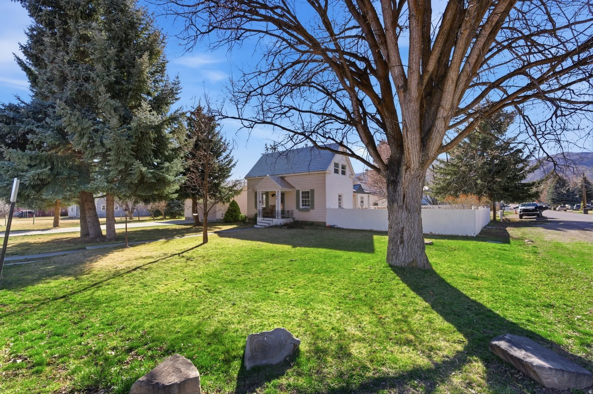 View of yard with covered porch