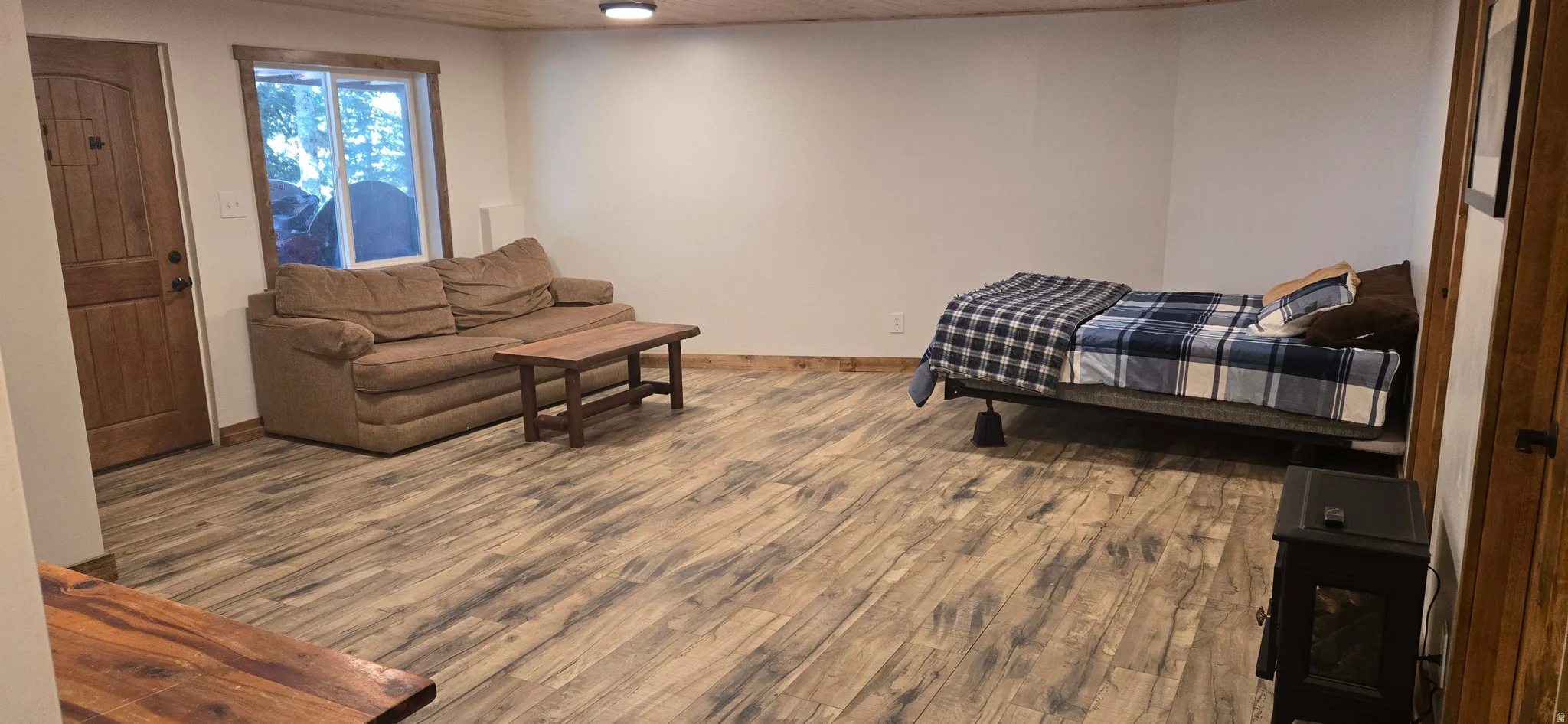 Bedroom featuring wood finished floors