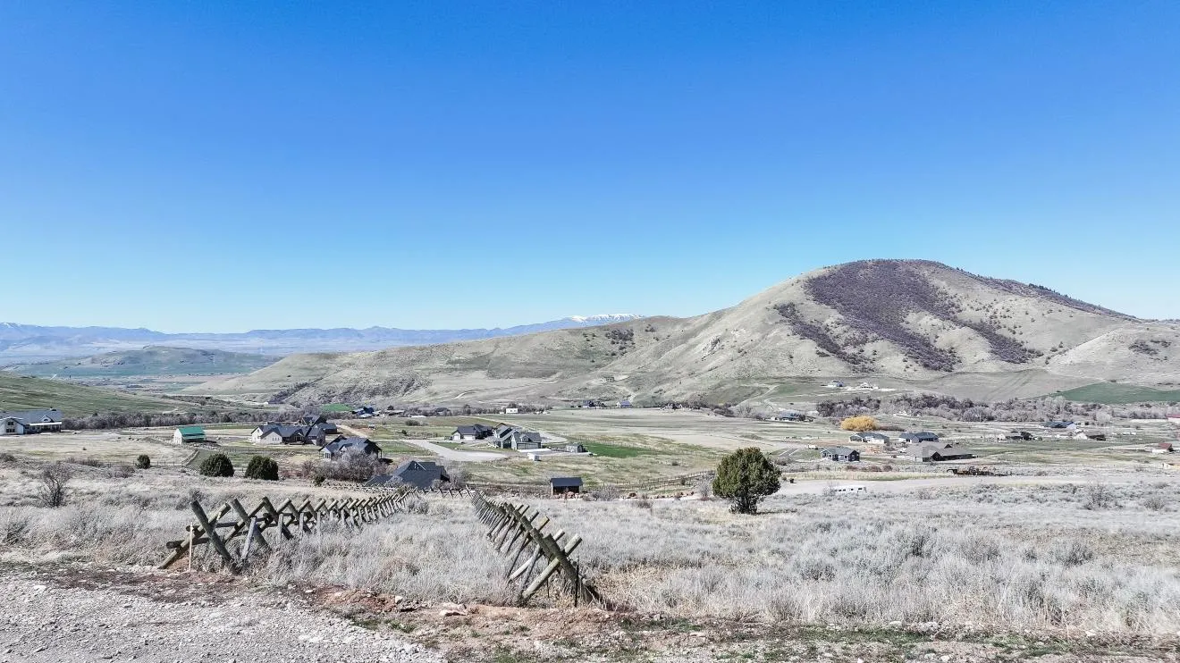 View of mountain background featuring rural landscape- horse trail that borders the south of the property