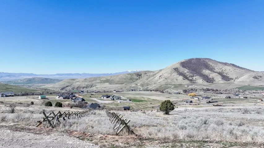View of mountain background featuring rural landscape- horse trail that borders the south of the property