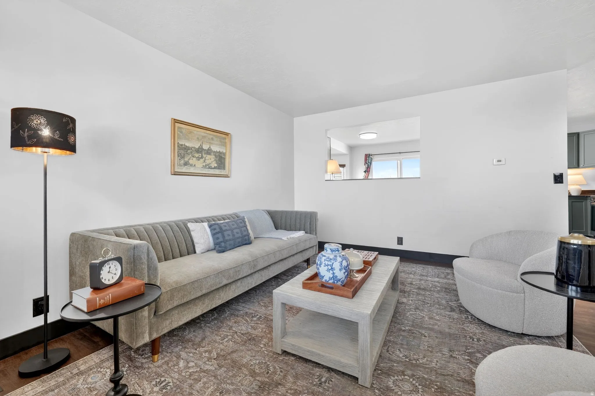Living room featuring wood finished floors and baseboards