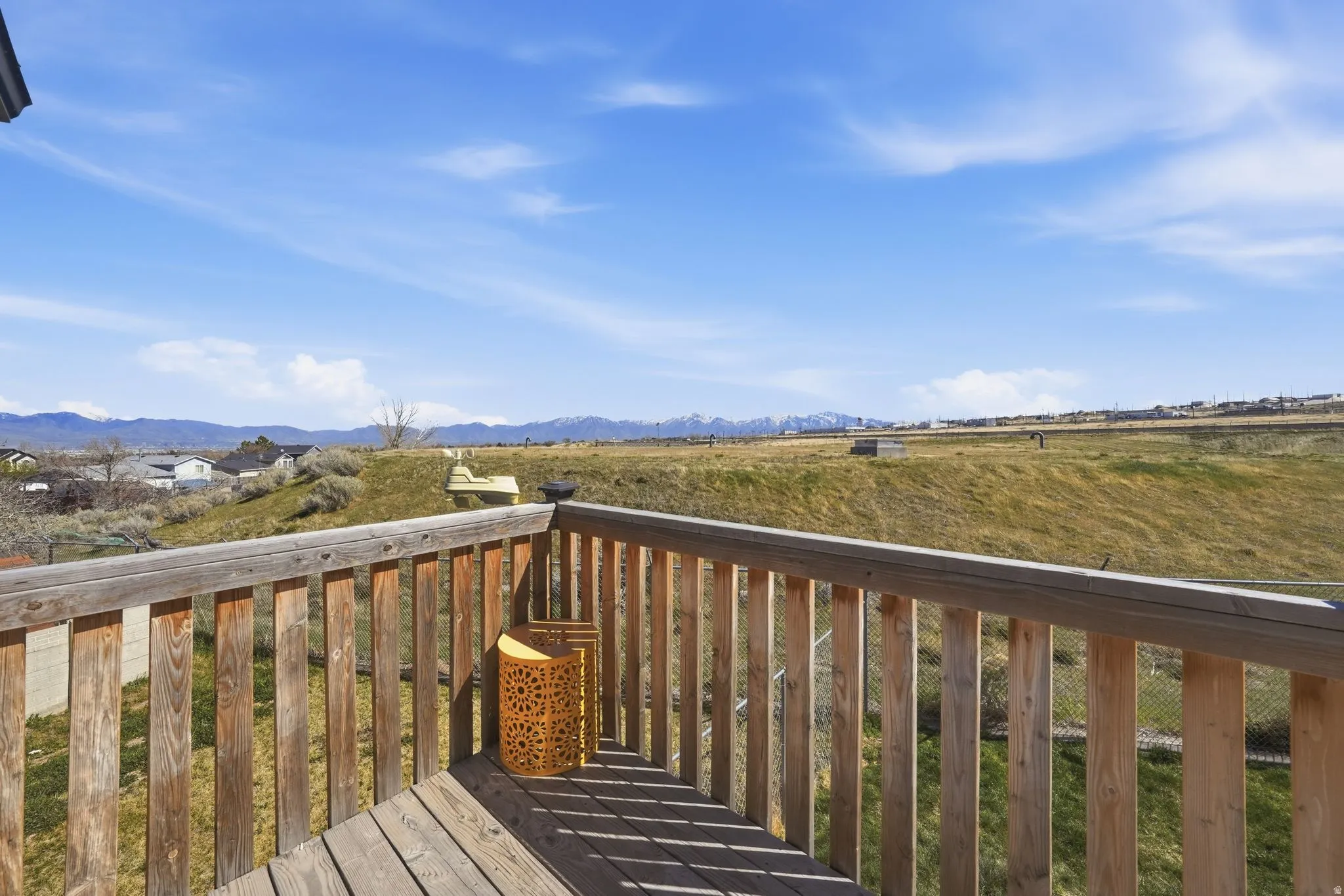 Wooden terrace featuring a mountain view