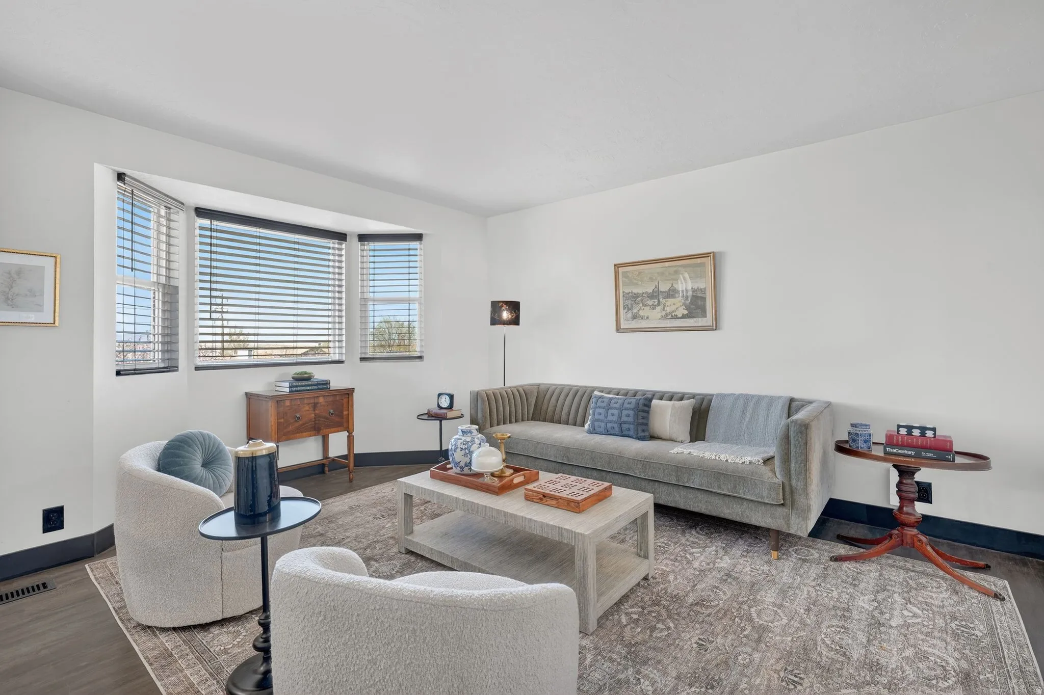 Living room with baseboards and wood finished floors