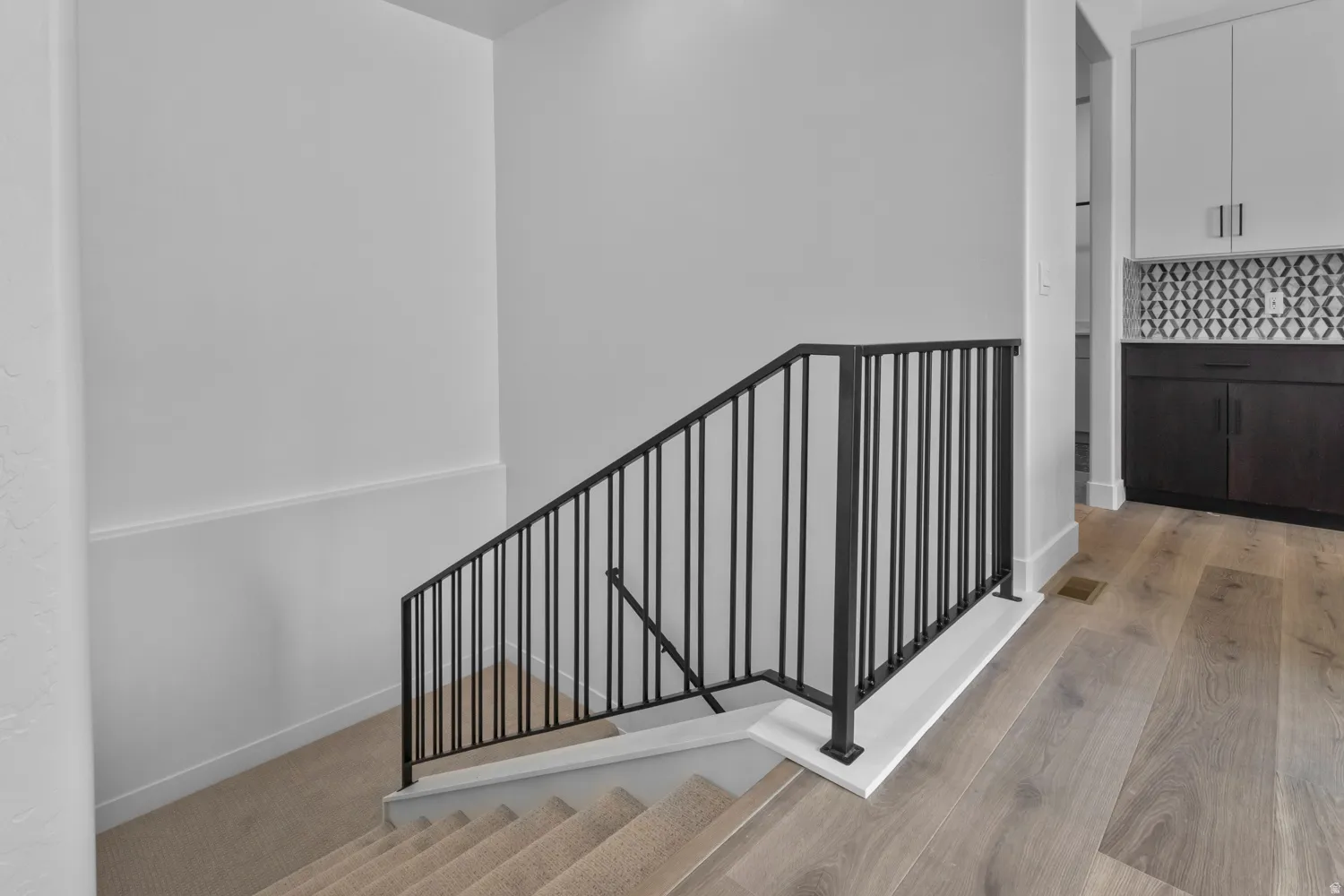 Stairs featuring baseboards