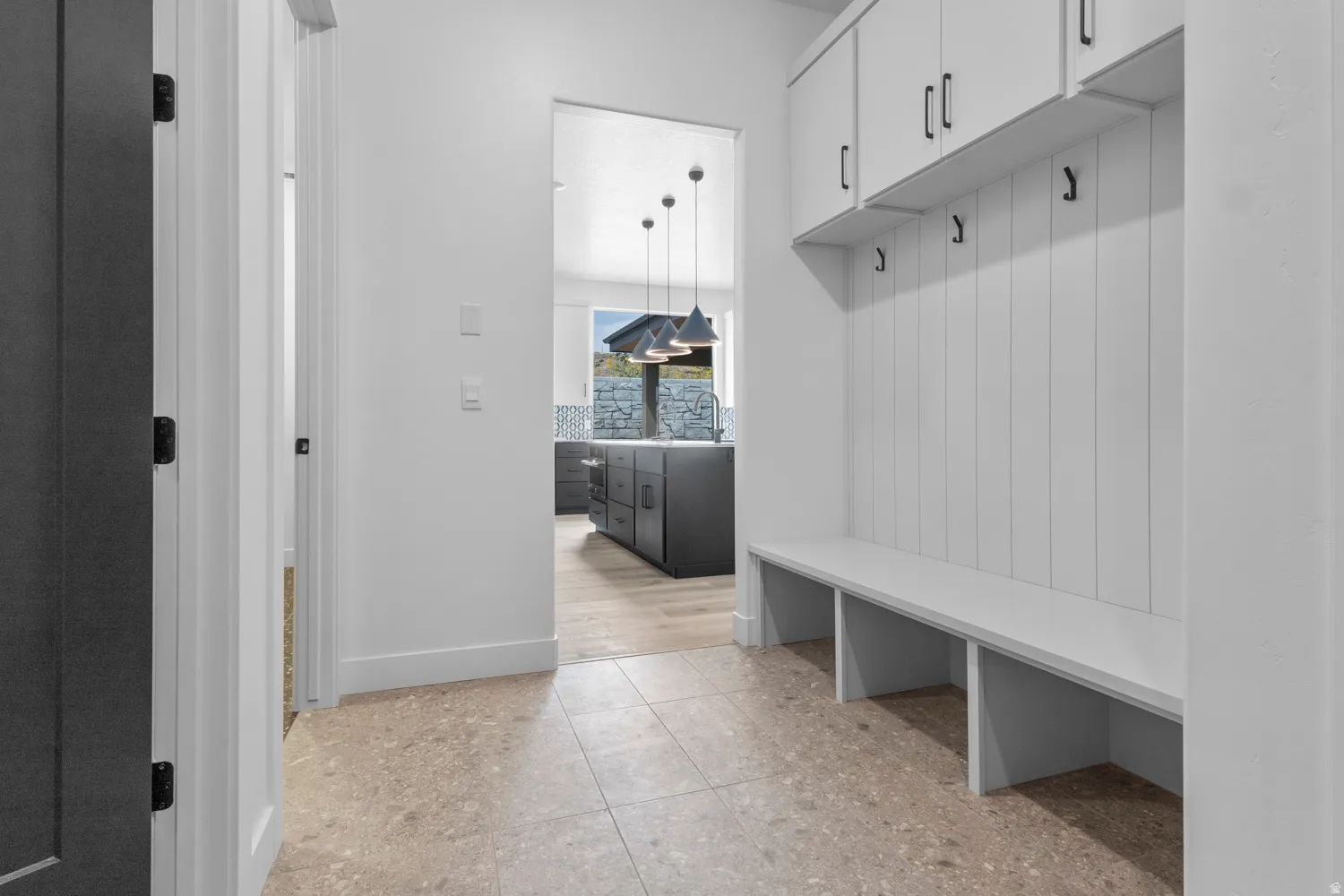 Mudroom featuring baseboards