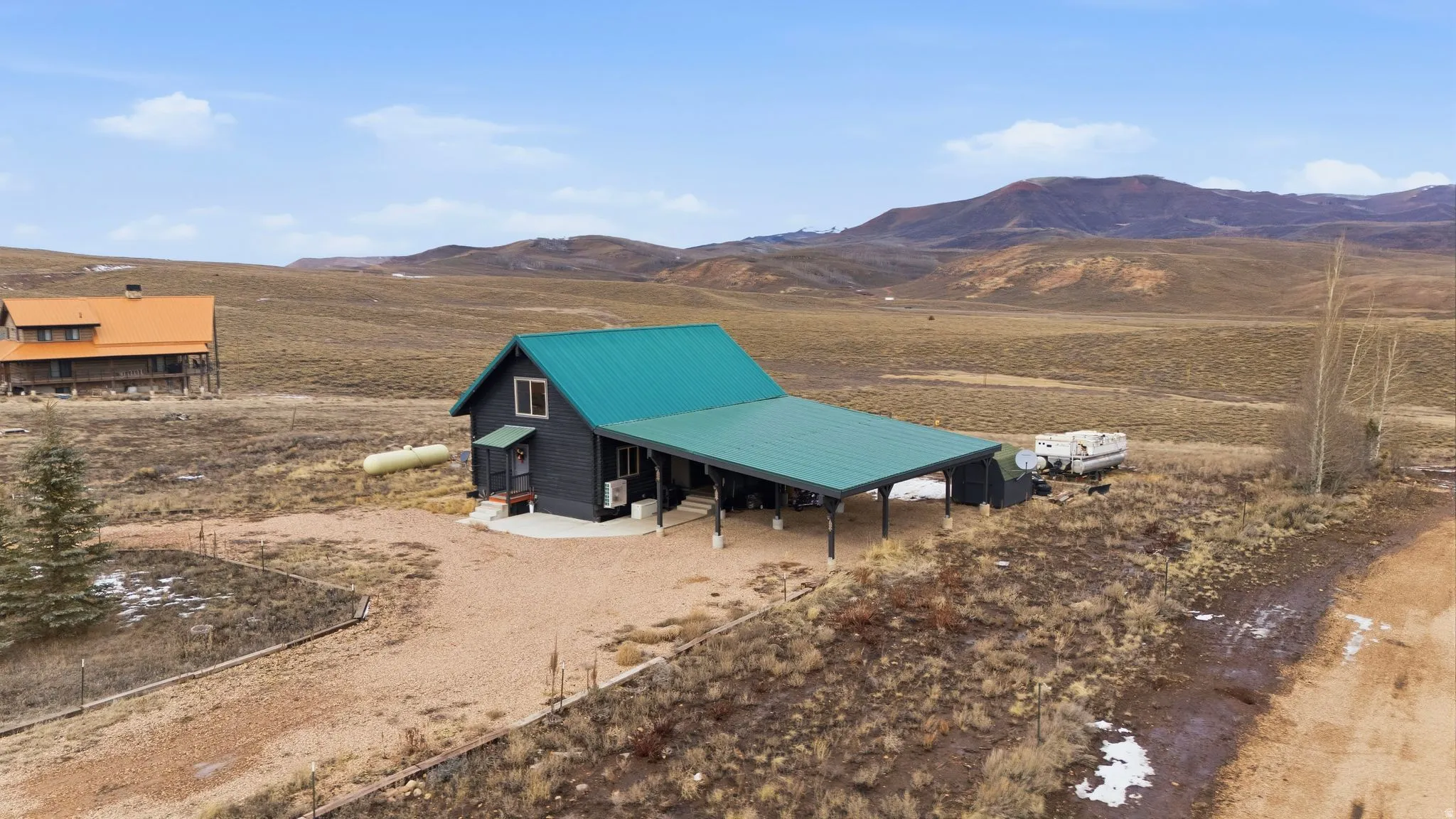 View of outbuilding with a mountain view and a view of countryside