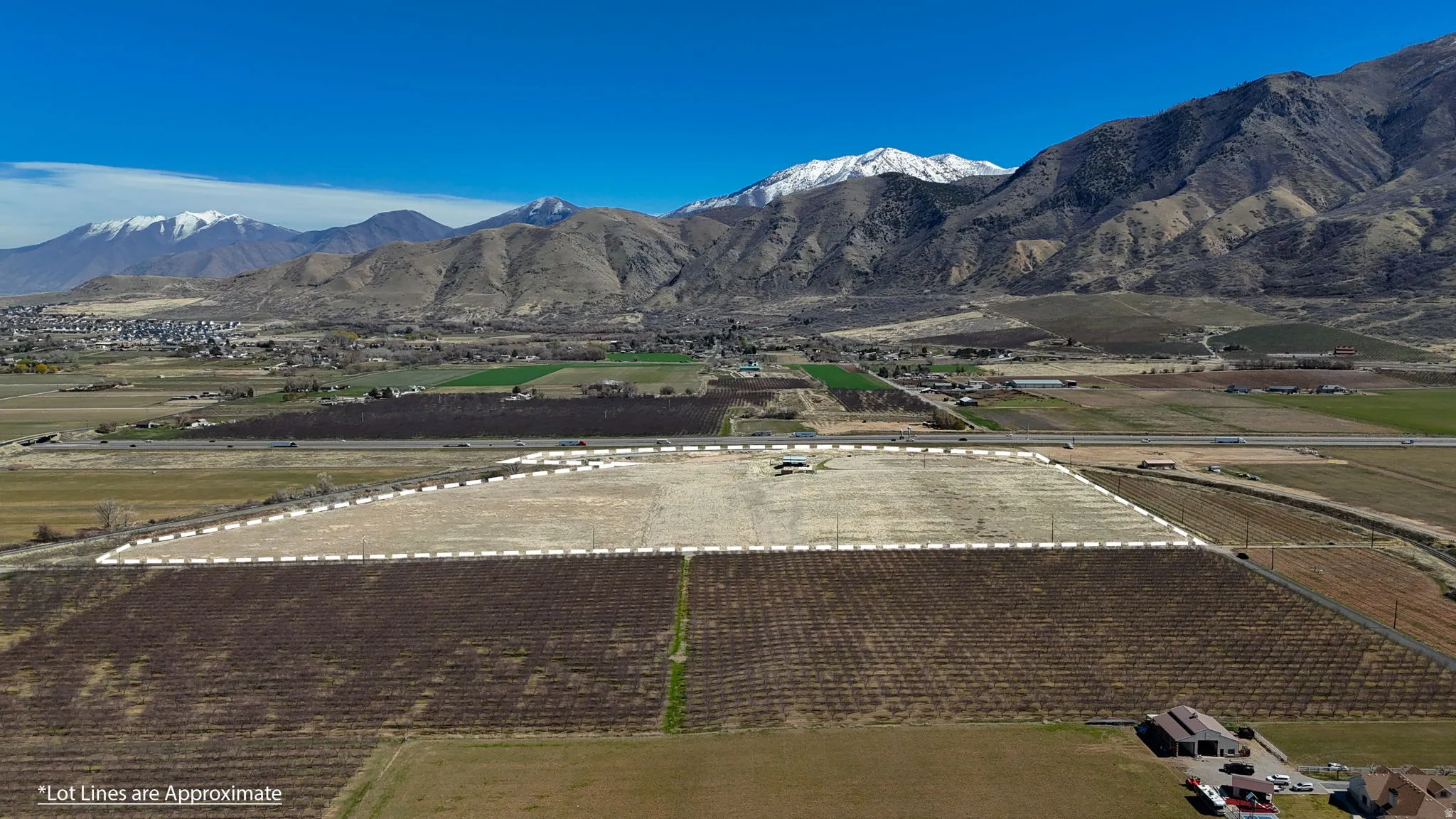 View of mountain background featuring abundant farmland and rural landscape