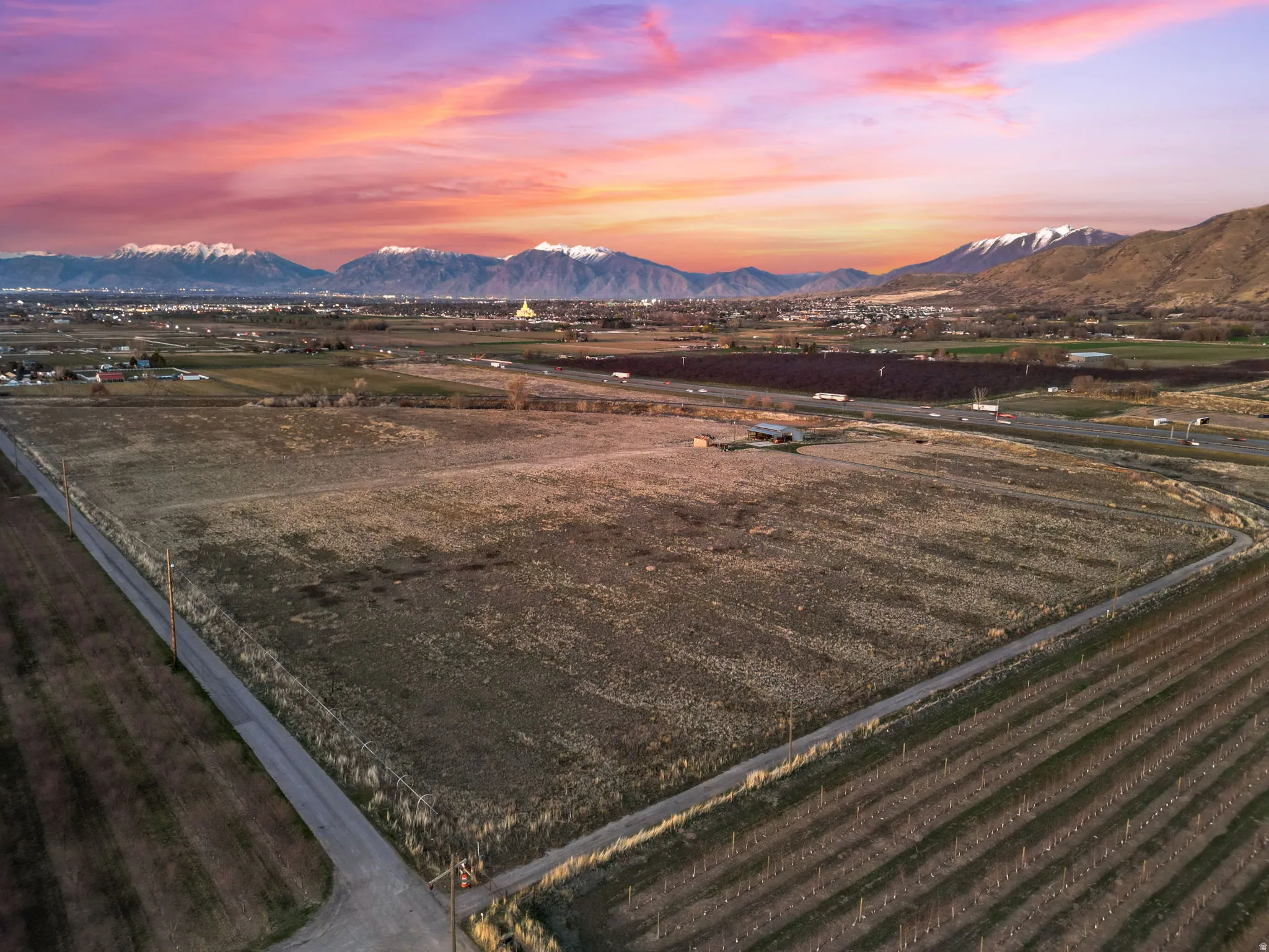 View of mountain background featuring rural landscape and large plots for crops