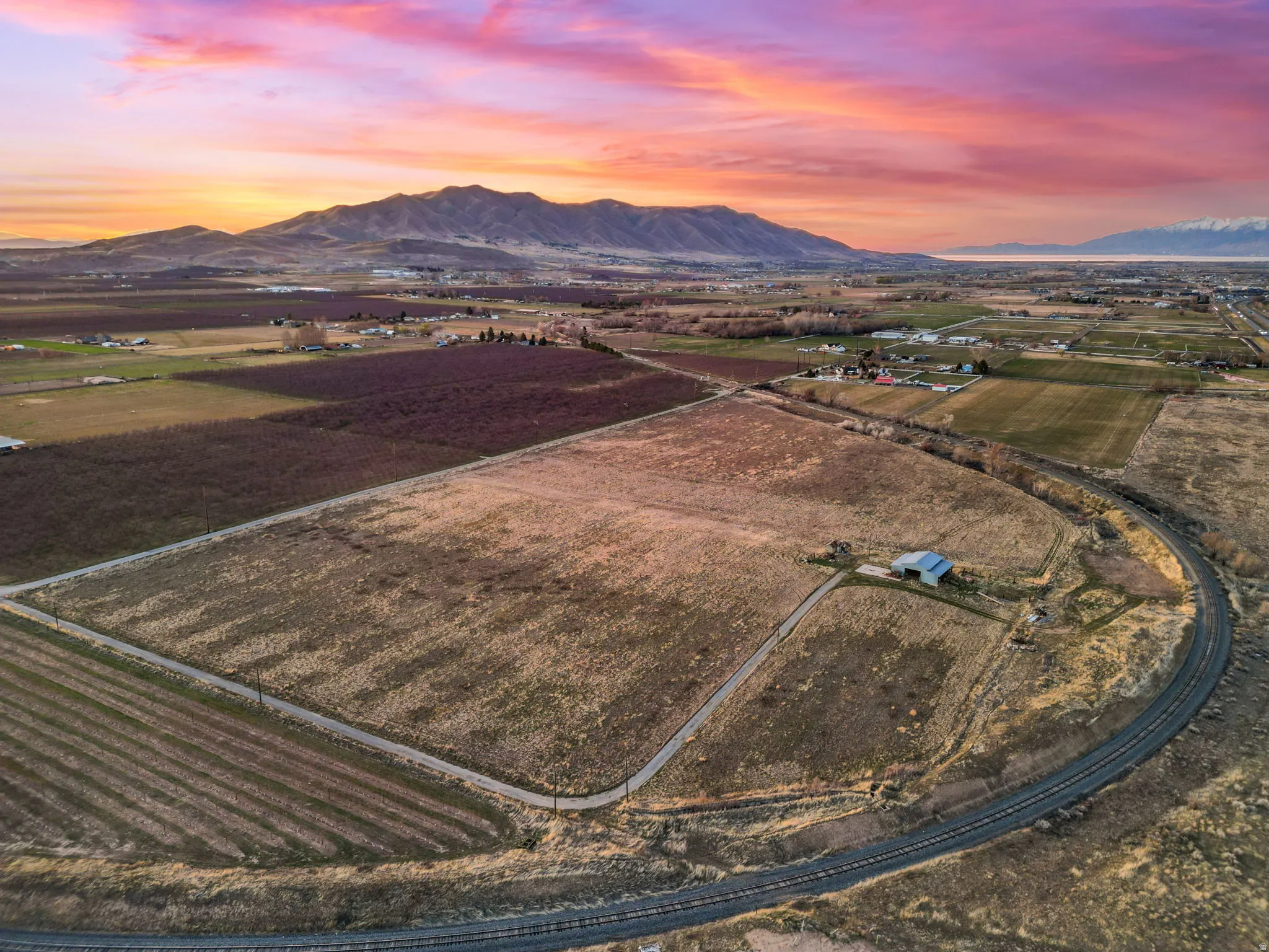 Overview of rural landscape with abundant farmland and mountains