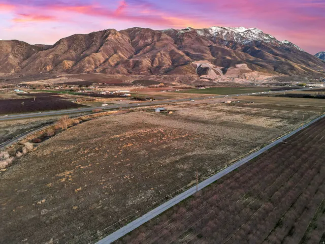 View of mountain backdrop featuring rural landscape