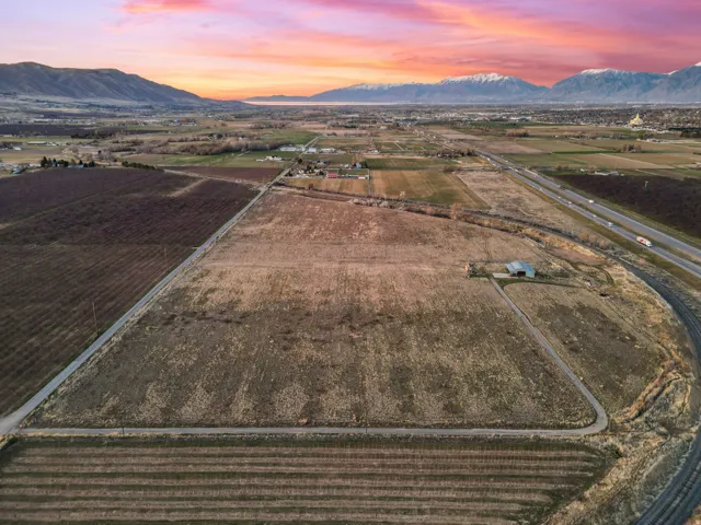 Aerial view at dusk of agricultural area, a rural view, and a mountain view