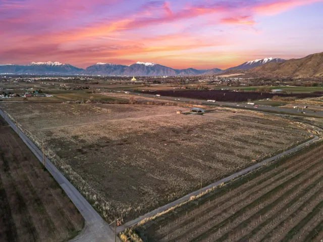 View of mountain background featuring rural landscape and large plots for crops