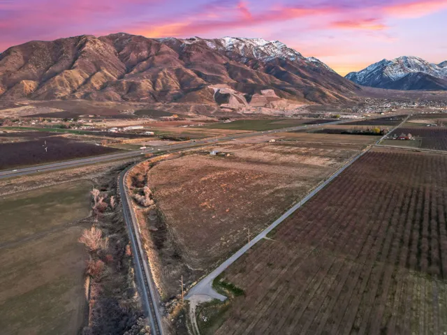 View of mountain backdrop featuring rural landscape and extensive farmland