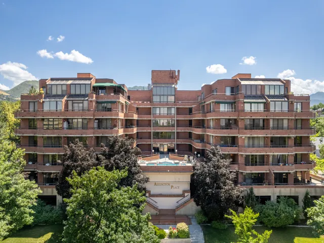 View of apartment building / complex featuring a mountain view