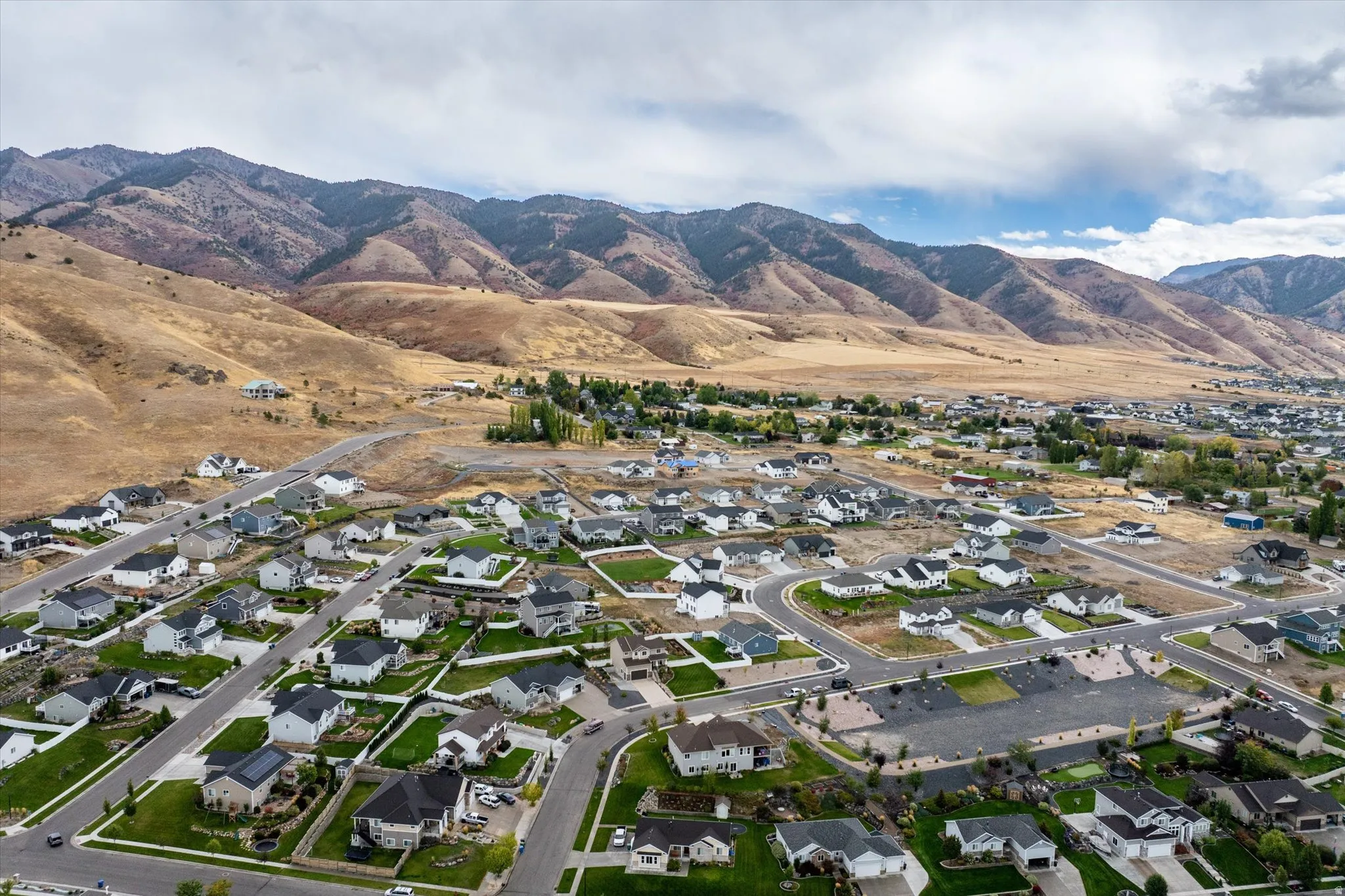 Aerial perspective of suburban area featuring mountains
