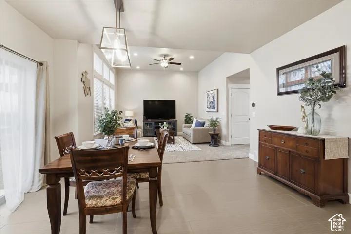 Dining area featuring ceiling fan and recessed lighting