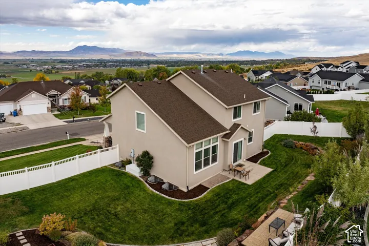 Aerial view of residential area with a mountain backdrop