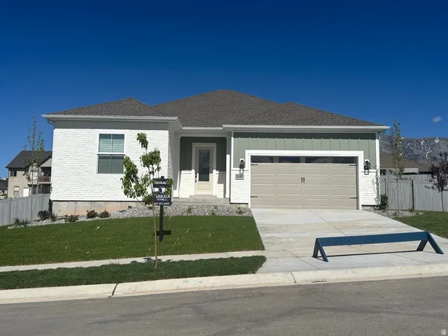 This is a Harmony C Elevation. The actual home will be a 3 car garage!!