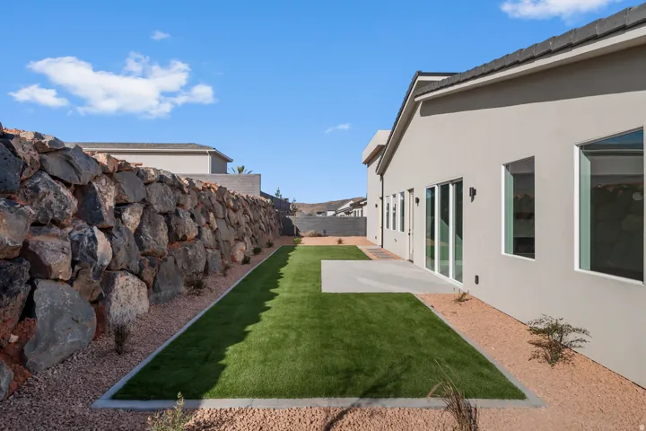 View of fenced backyard