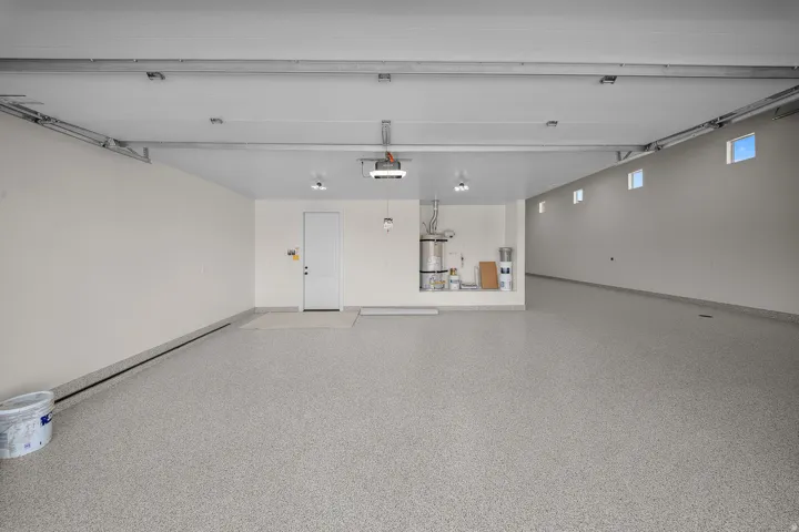 Garage with strapped water heater