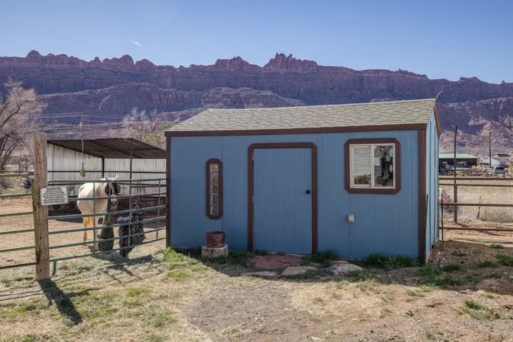 View of outdoor structure with view of Moab Rim