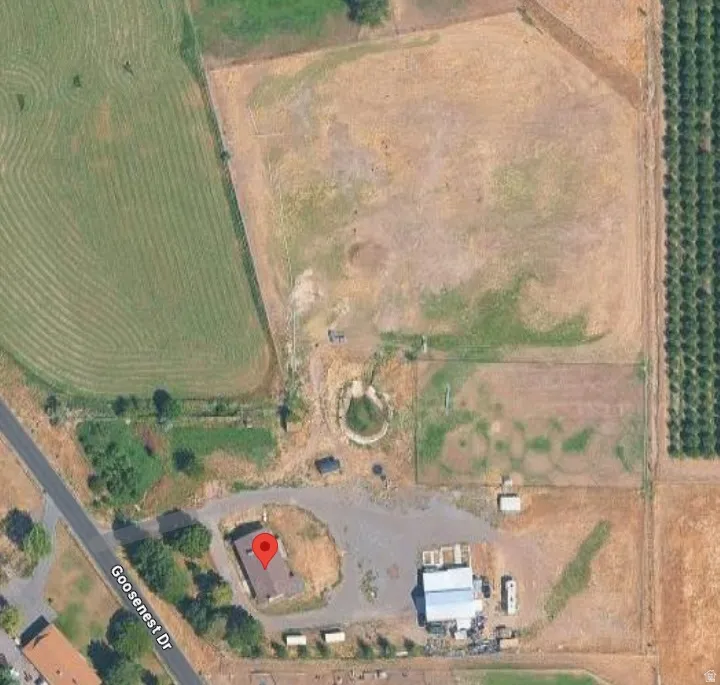 Aerial view of sparsely populated area featuring abundant farmland